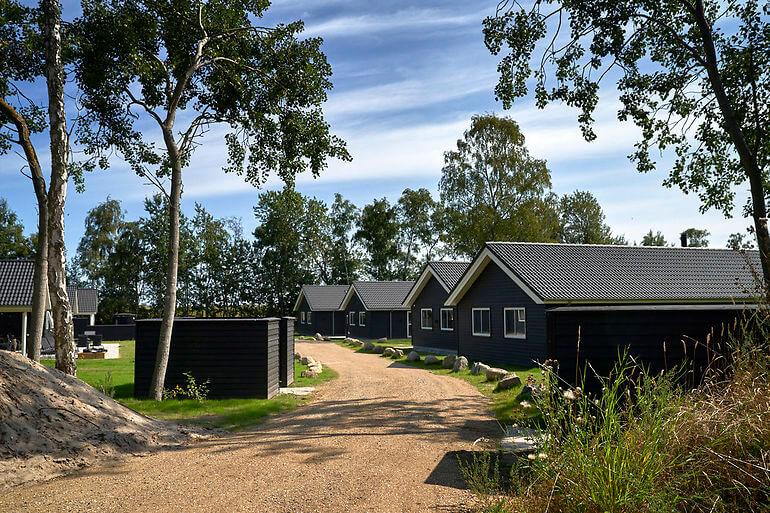 Ingen erstatningspligt over for naboer til poolsommerhuse
